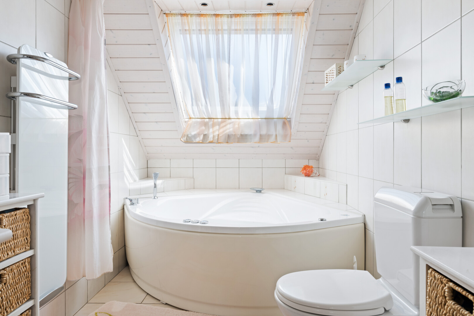 bathroom with tile walls, a bath, vanity, and light tile patterned flooring