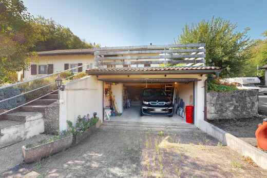 façade avec property visible, allée, et day time