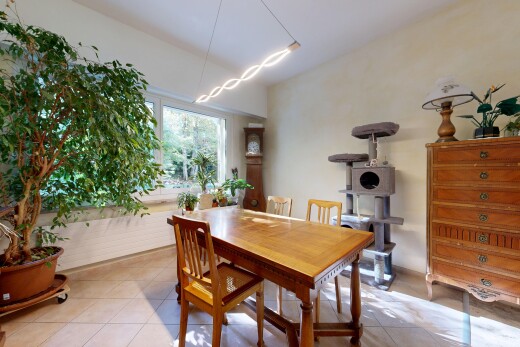 dining area with light tile patterned flooring