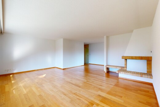pièce vide avec cloison sèche, drywall, inside property, sol en finition bois, et wood finish floor