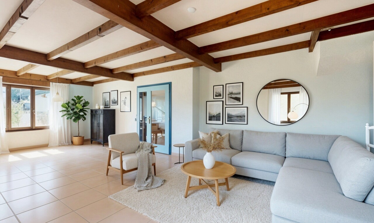 salon avec inside property, beamed ceiling, plafond à poutres, drywall, et cloison sèche
