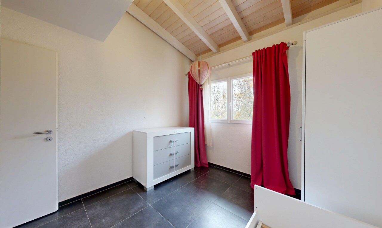 unfurnished room with dark tile patterned flooring and wood ceiling