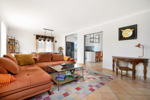 living room with light tile patterned floors