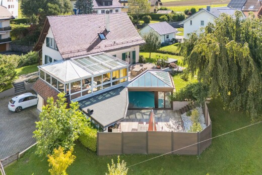 view of home featuring a residential view and a patio area