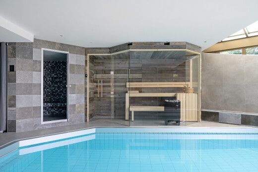 view of swimming pool with elevator and a pool