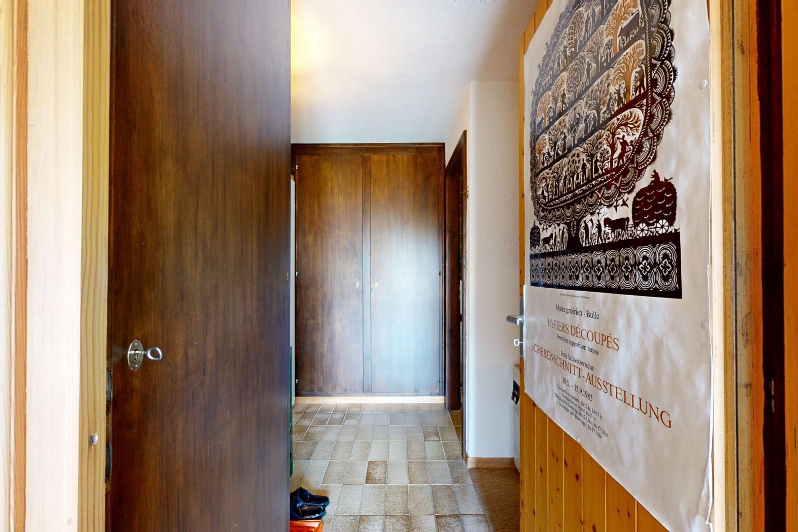 hallway featuring baseboards