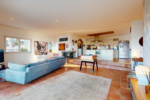 living area featuring light tile patterned flooring and recessed lighting
