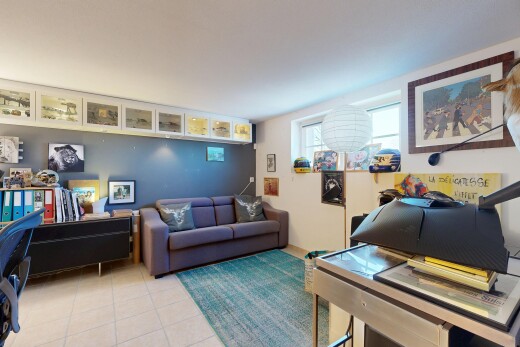living room with tile patterned flooring
