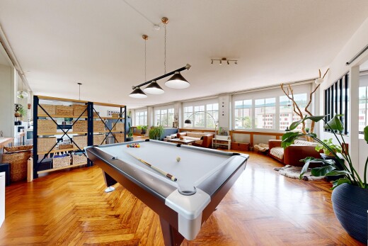 living area with parquet flooring, billiards table, and plenty of natural light