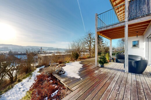 view of wooden deck with a balcony