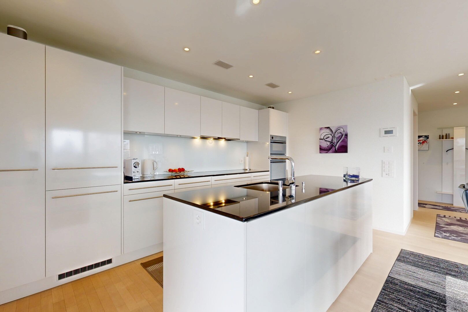 kitchen featuring white cabinets, recessed lighting, double oven, light wood-type flooring, and modern cabinets