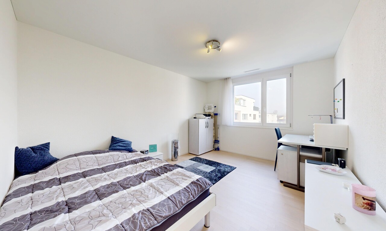 room with light wood-type flooring and washer / clothes dryer