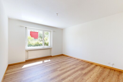 empty room featuring light wood-style floors and baseboards