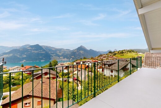 balcony with a mountain view and a residential view