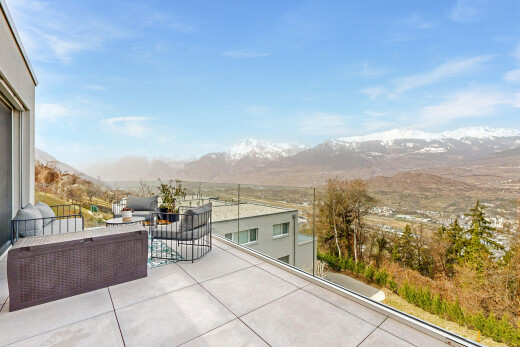 terrace featuring a patio, a mountain view, and outdoor seating