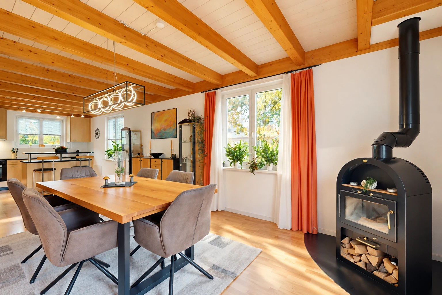 dining room featuring a wood stove, light wood finished floors, and a wood ceiling with exposed beams
