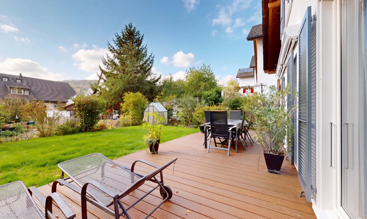 view of wooden terrace with outdoor dining space