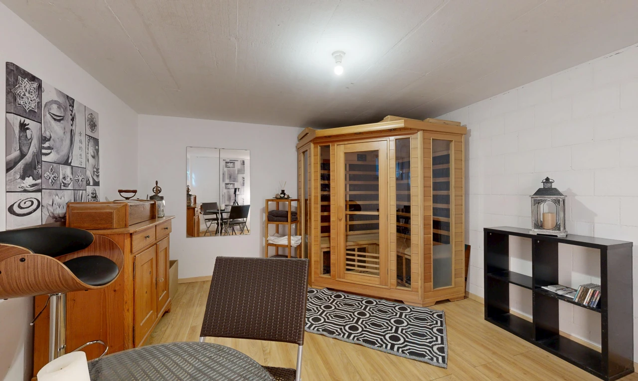 dining space with light wood-type flooring and a sauna