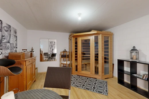 dining space with light wood-type flooring and a sauna
