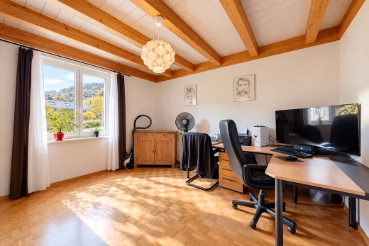 office area featuring beam ceiling and parquet flooring
