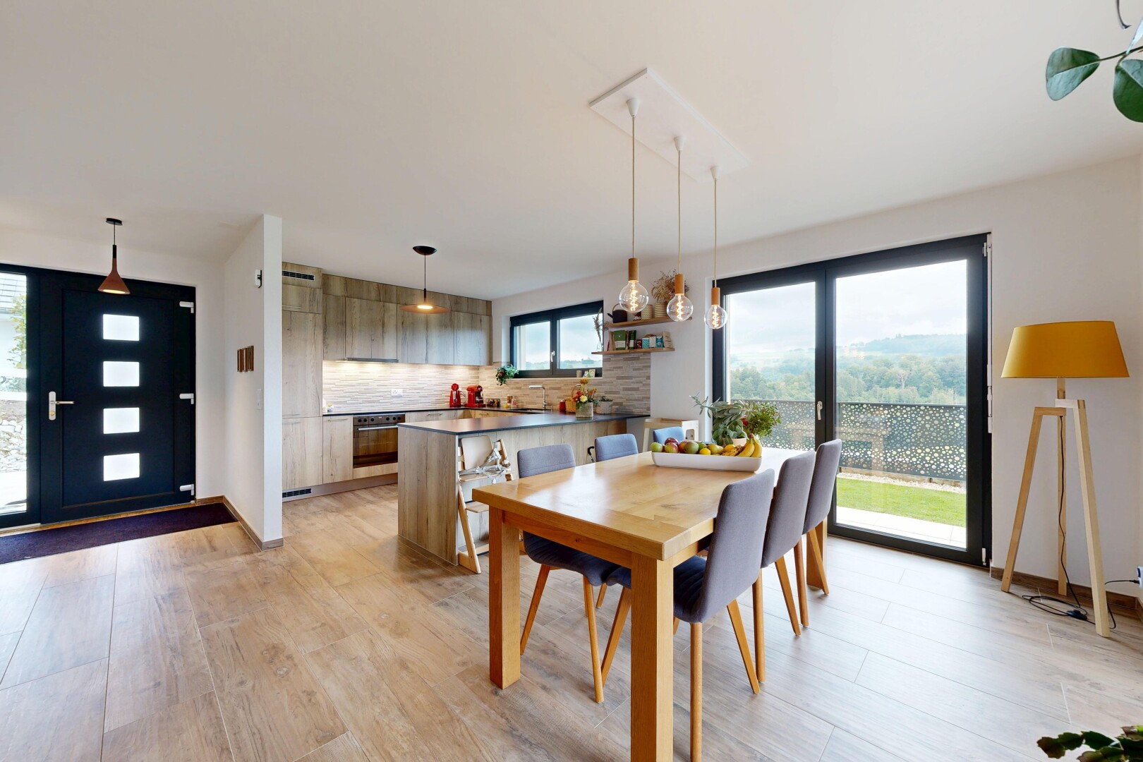 dining room with light wood finished floors and baseboards