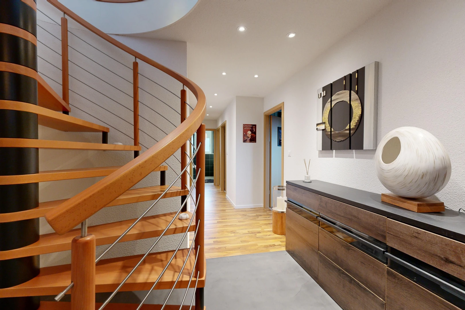stairway featuring hardwood / wood-style flooring