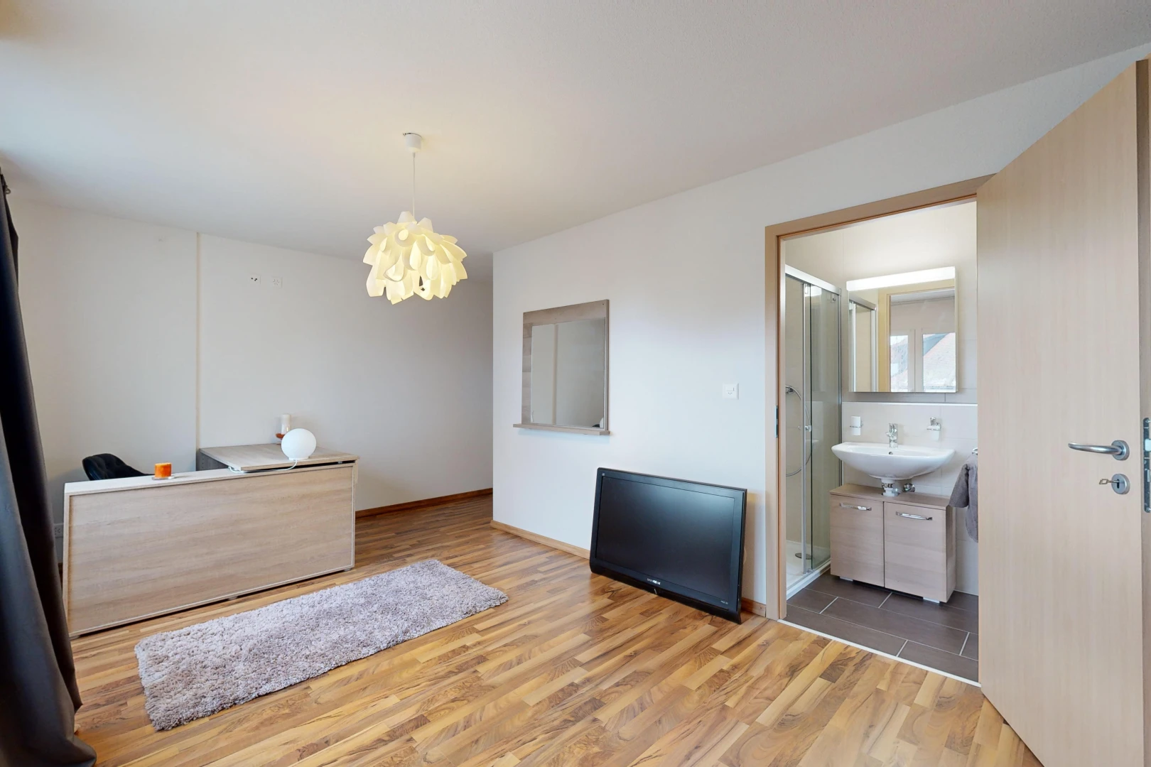 interior space with hardwood / wood-style flooring and sink