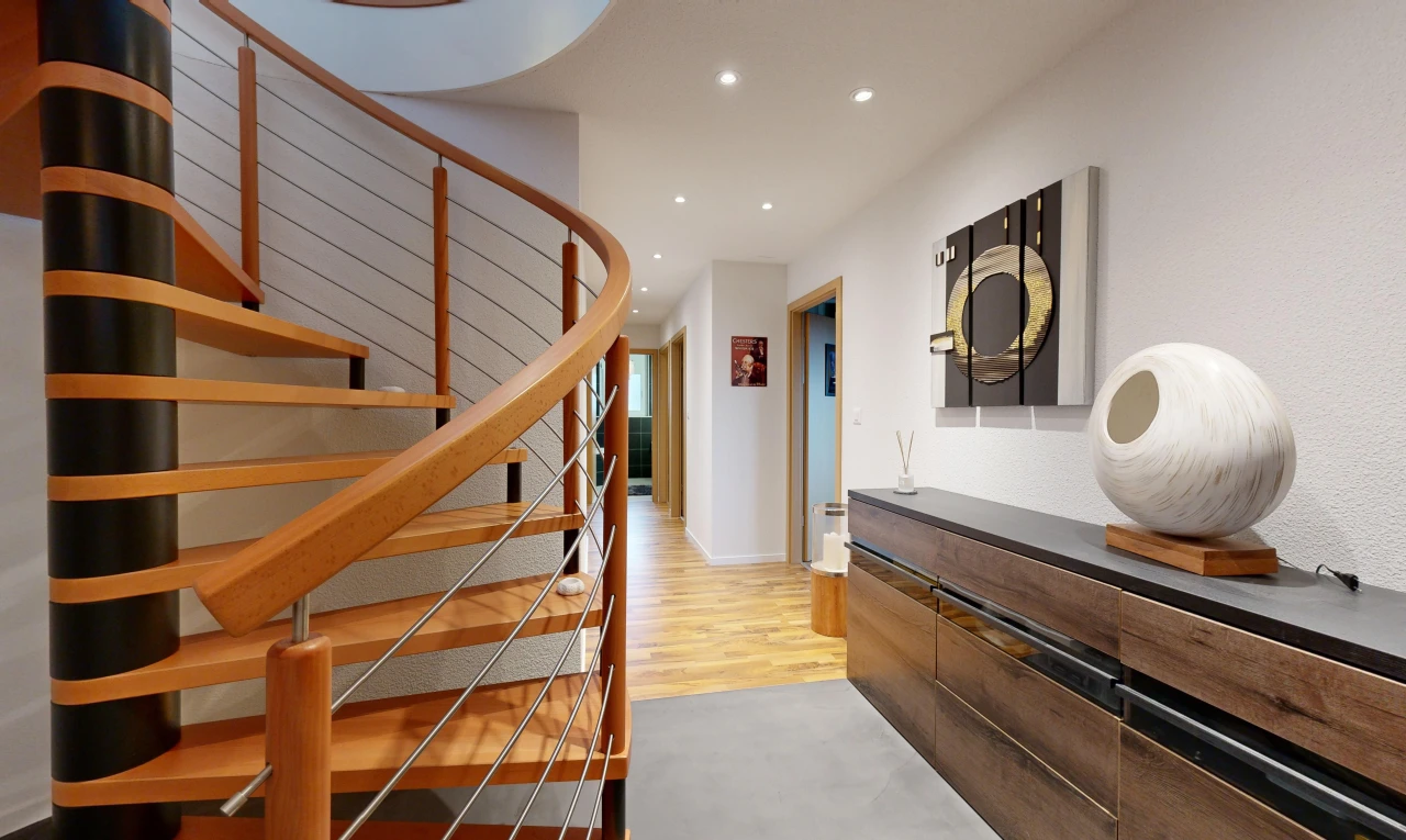 stairway featuring hardwood / wood-style flooring