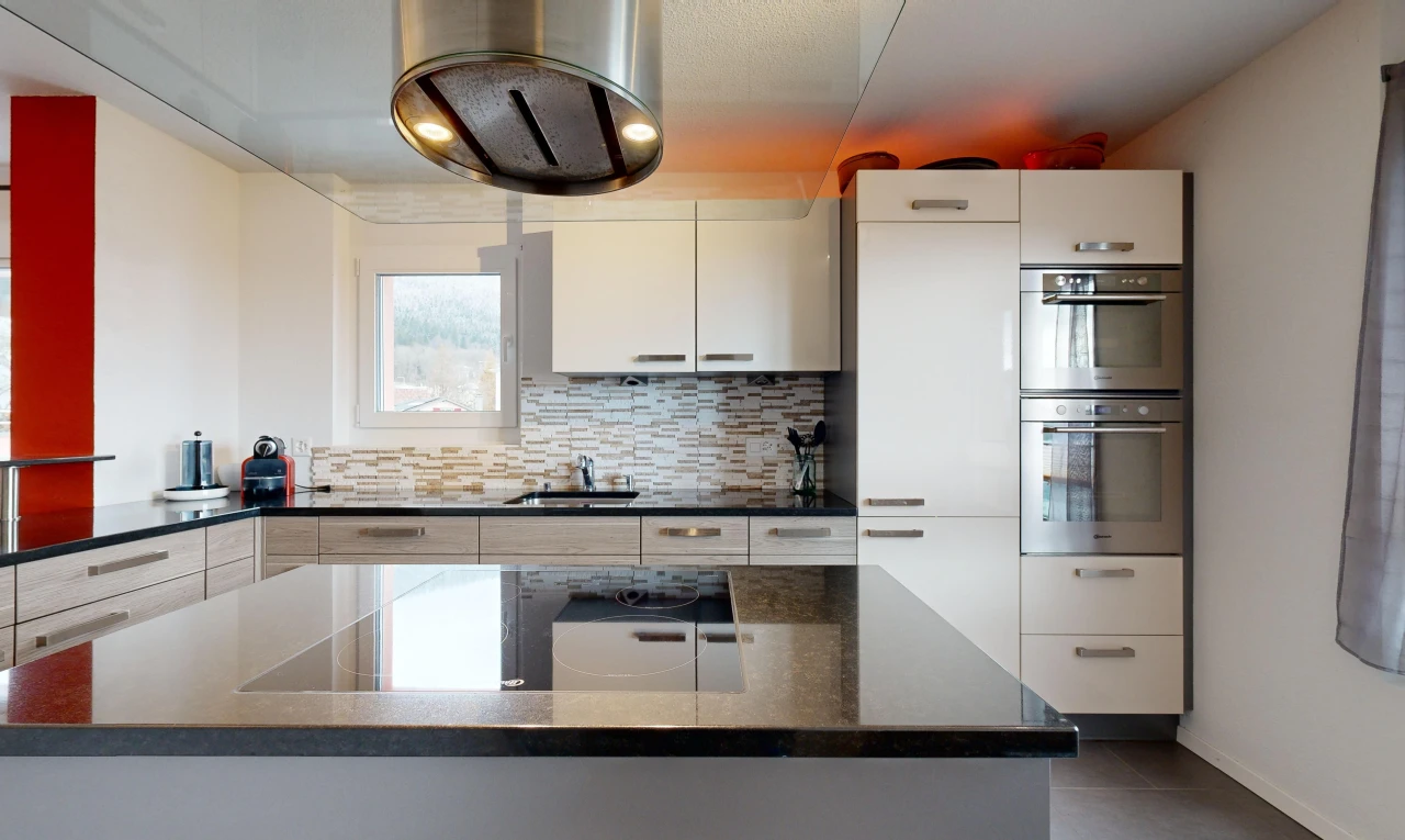 kitchen featuring tasteful backsplash, white cabinetry, double oven, and sink