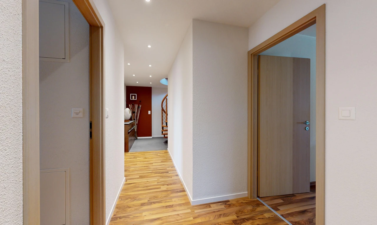 hall / corridor with wood-type flooring