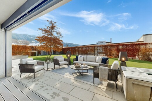 terrace featuring a mountain view, a patio area, and a fenced backyard
