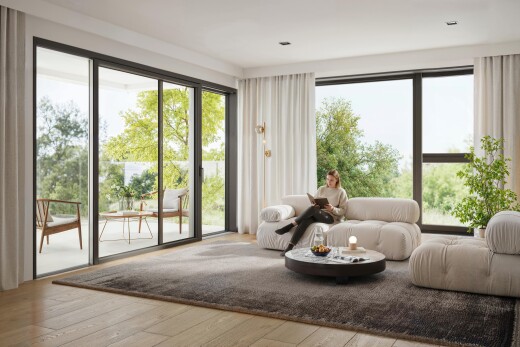 wohnzimmer mit inside property, natürliches licht, natural light, holzfußboden, und wood finish floor