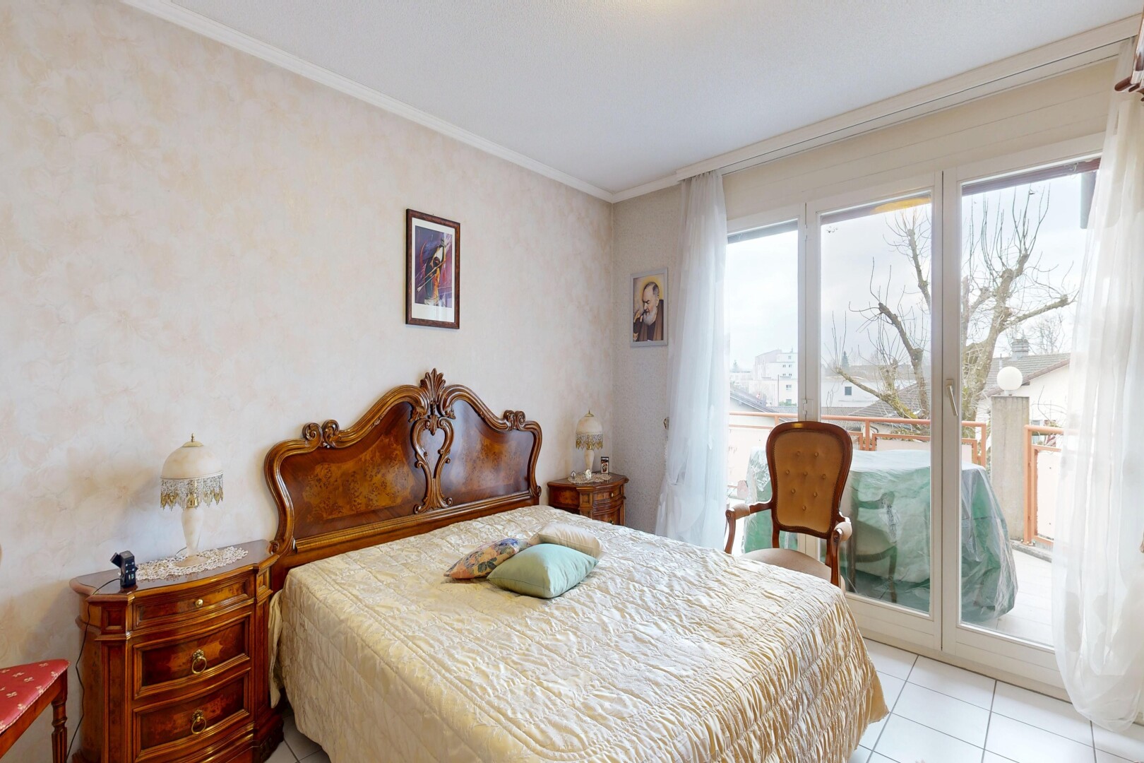 room with ornamental molding, access to exterior, and light tile patterned floors