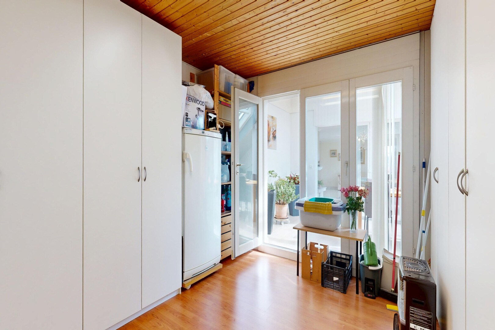 room / bedroom with white refrigerator, wooden ceiling, and light wood-type flooring