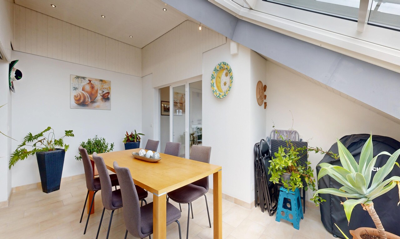 dining room with a high ceiling