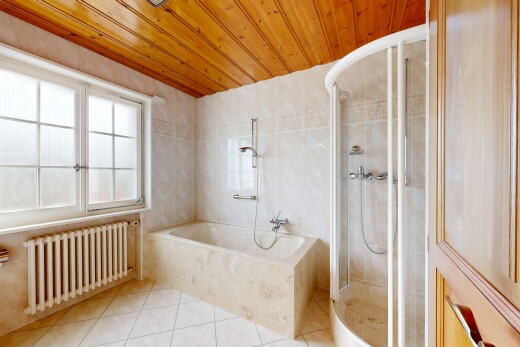 full bath with radiator heating unit, a stall shower, wooden ceiling, tile walls, and a bath