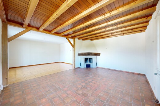 spare room featuring a wood ceiling with exposed beams, tile patterned floors, and a fireplace