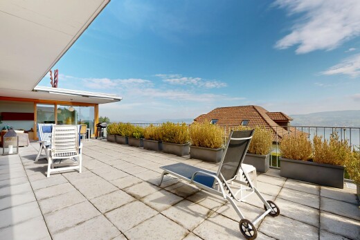 patio / terrace featuring a patio area, outdoor dining space, and a water view