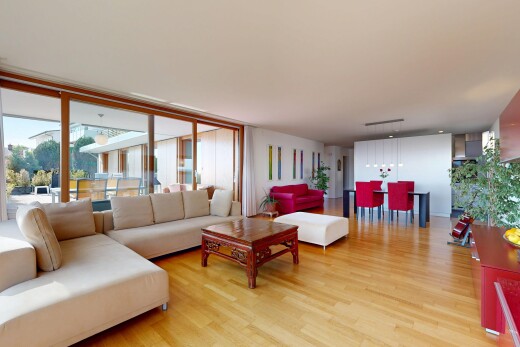 living / dining area with light wood-style flooring