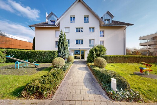 außenansicht mit dachgaube, day time, stuckverkleidung, und property visible