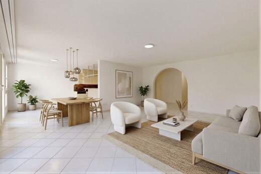salon avec inside property, cloison sèche, drywall, sol en carrelage, et tile floor