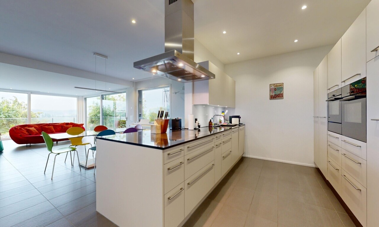 küche mit dunstabzugshaube, einbauleuchten, dark countertops, arbeitsplatten, und drywall