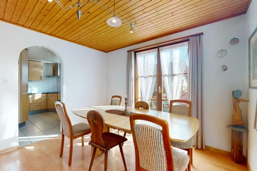 dining space featuring light hardwood / wood-style flooring and wooden ceiling
