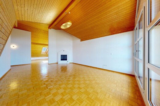 unfurnished room with parquet floors, wood ceiling, lofted ceiling with beams, a fireplace, and healthy amount of natural light