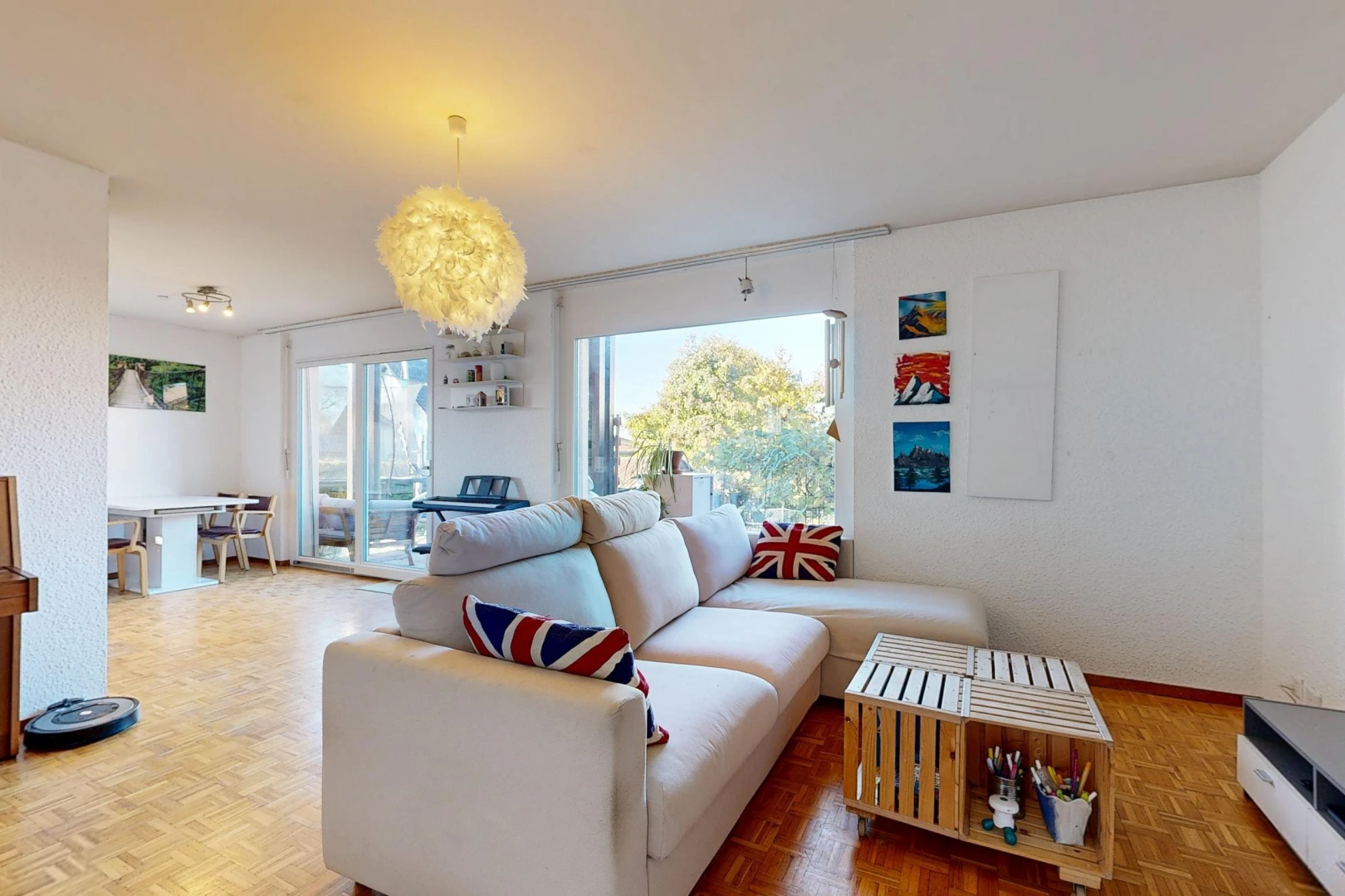 living area with parquet floors and access to outside