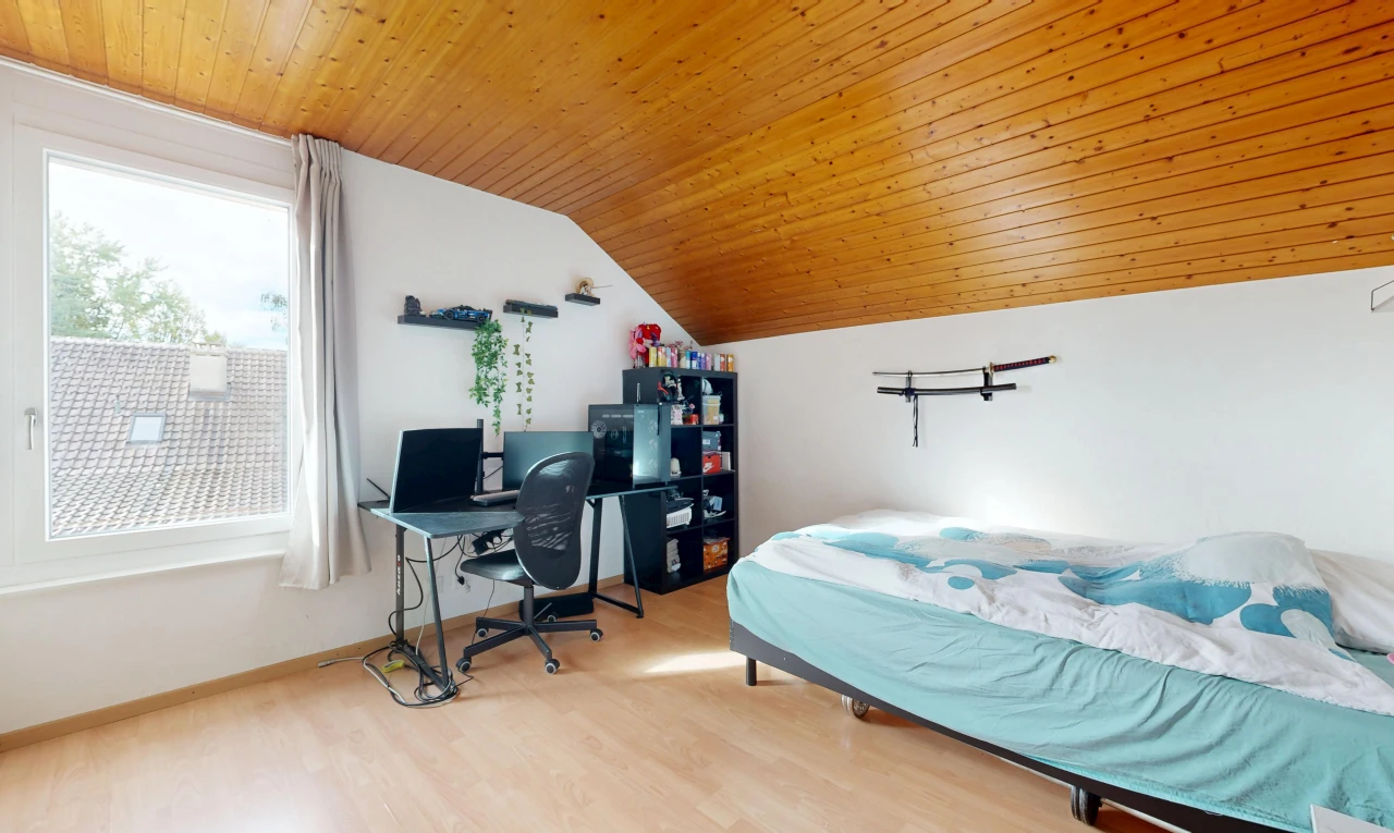 room / bedroom featuring a vaulted wood ceiling, light wood finished floors, and an office area