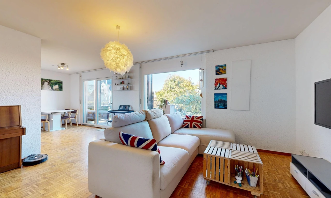 living area with parquet floors and access to outside