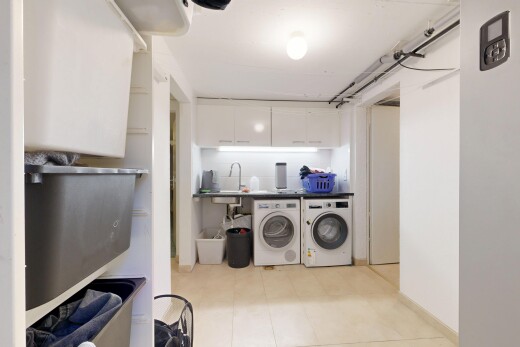 laundry area featuring independent washer and dryer and countertop space
