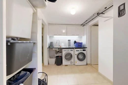laundry area featuring independent washer and dryer and countertop space