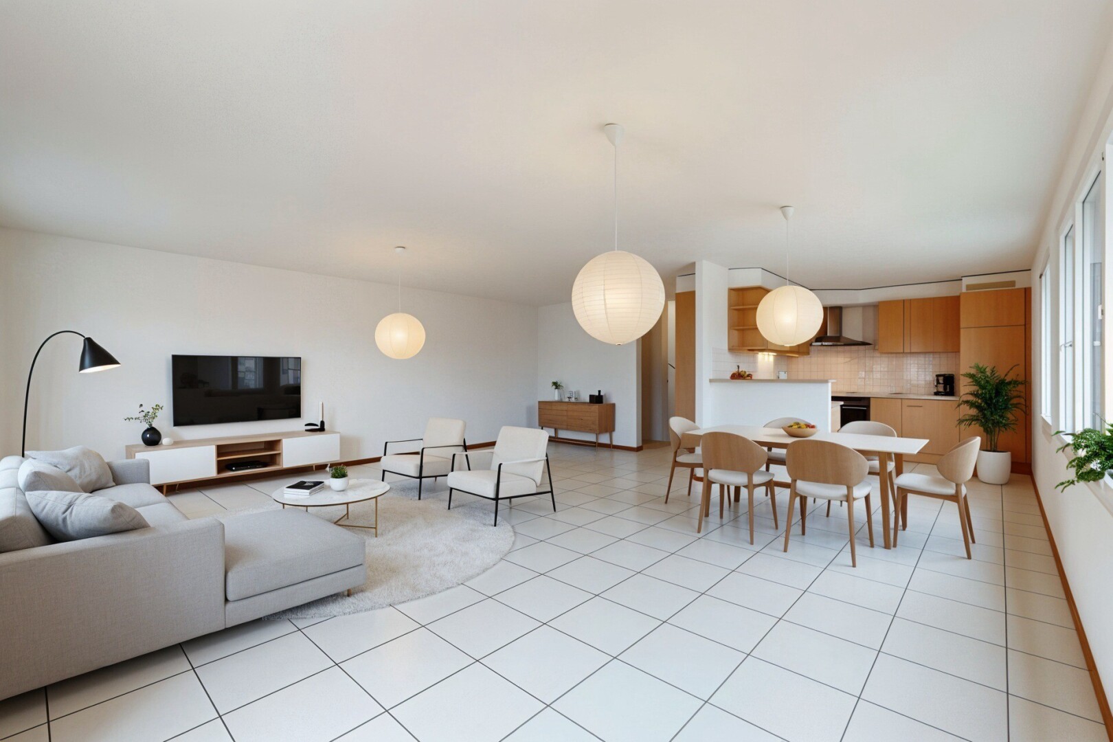 salon / salle à manger avec télévision, cloison sèche, drywall, inside property, et lumière naturelle
